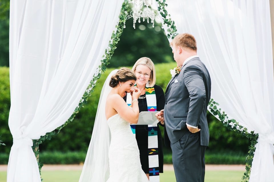 Bride and Groom with Officiant Heidi Gessner