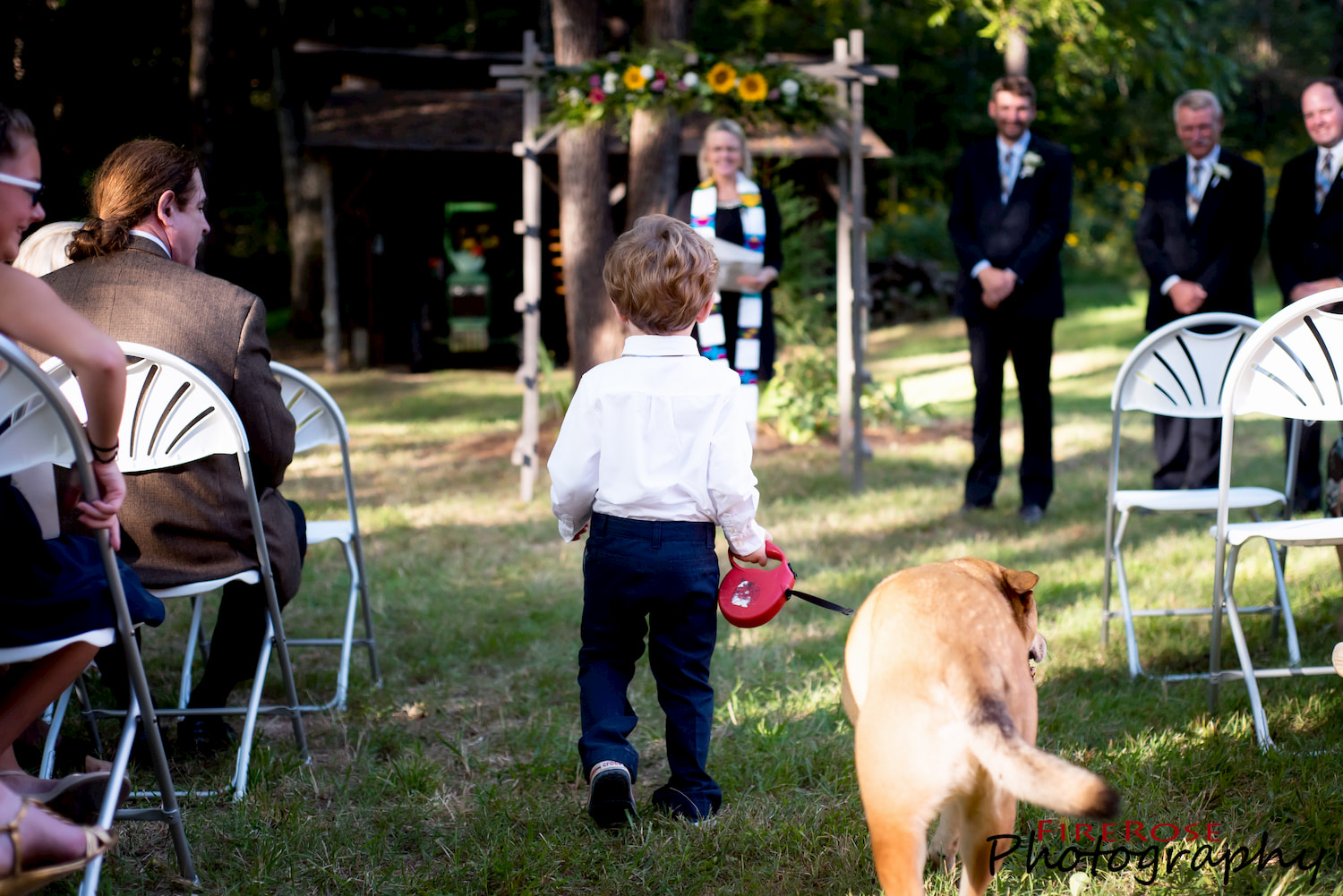 Dog and Boy Walking Down Aisle