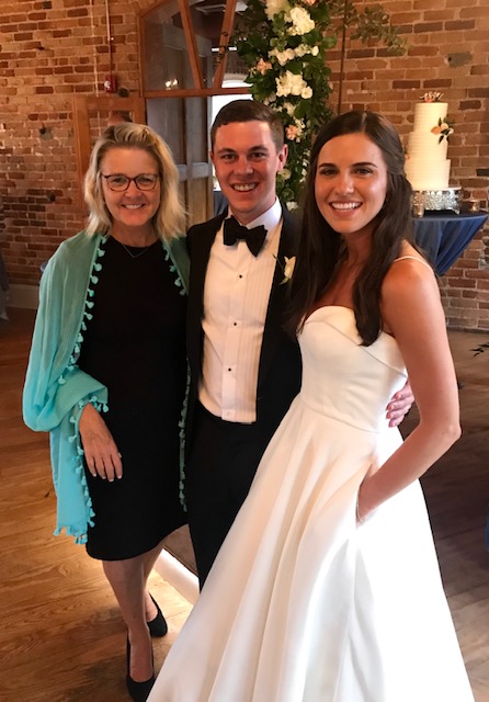 Officiant Heidi Gessner with Bride and Groom