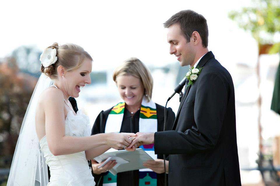 Bride and Groom Putting Rings on